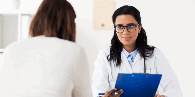 doctor talking with patient about ectopic pregnancy
